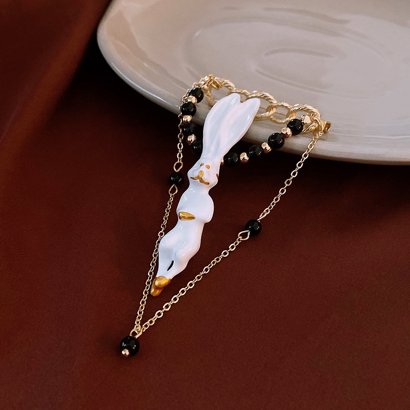 133# broche-Lapin doré