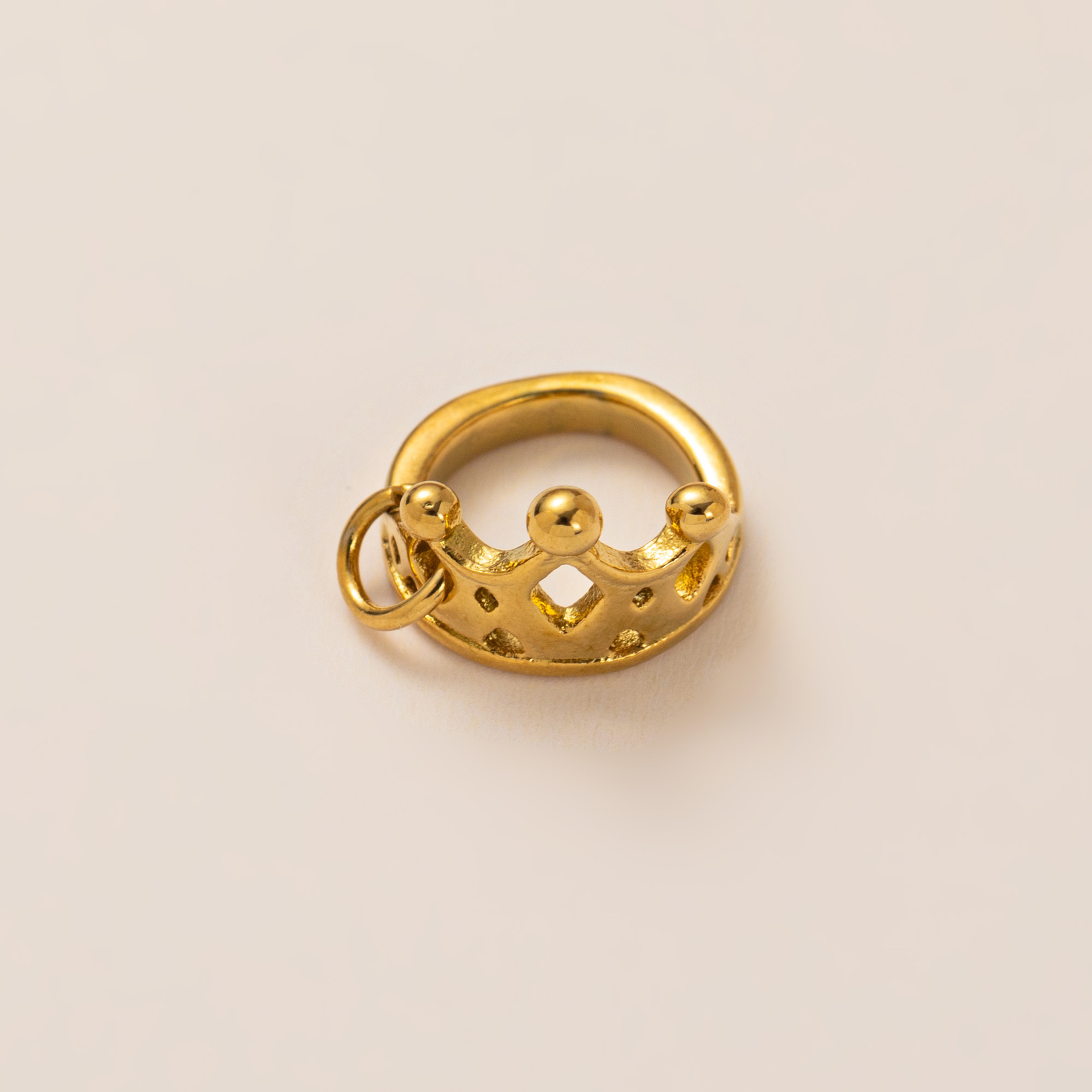 Golden crown pendant