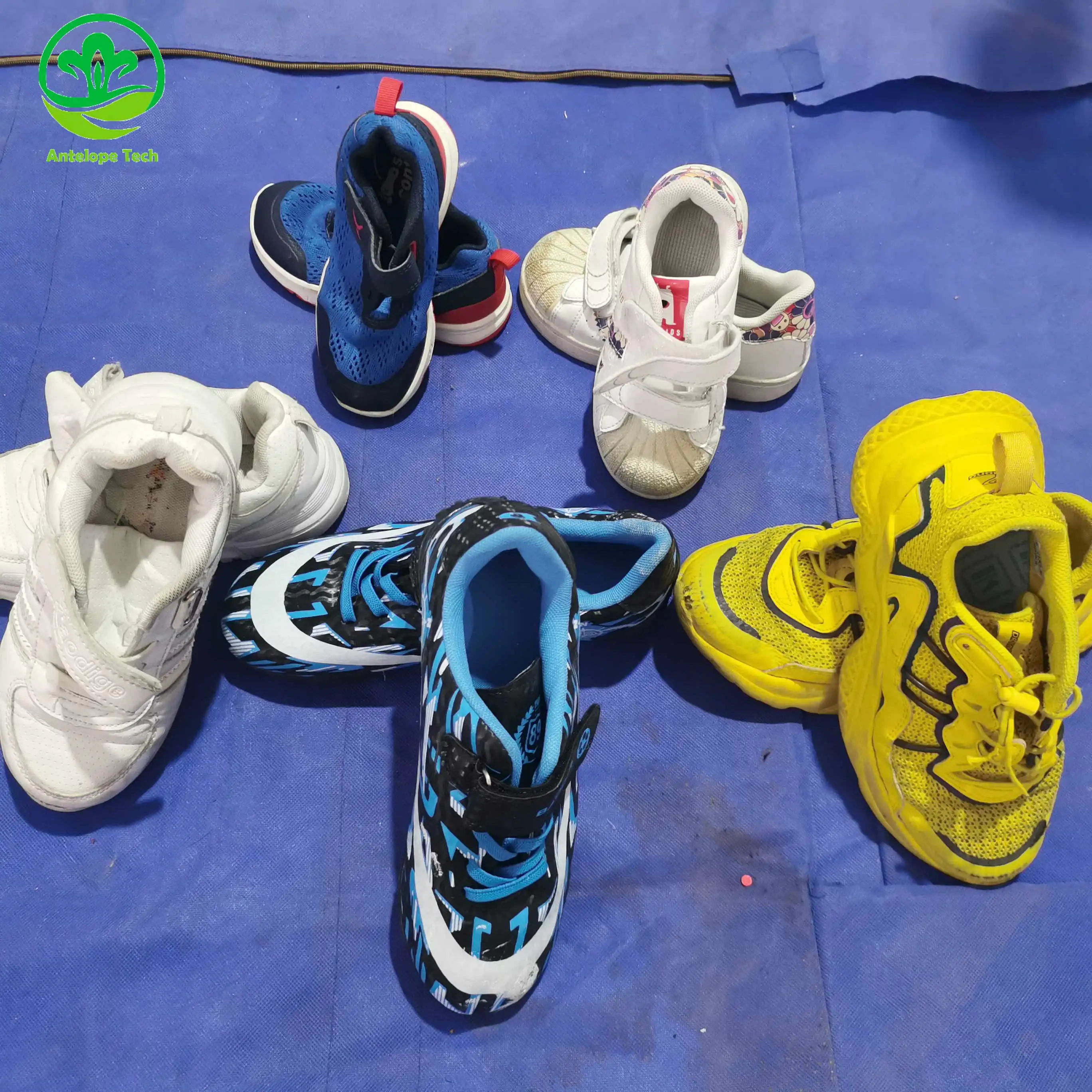 Sepatu anak bekas dari pemasok Cina penjualan langsung pabrik pakaian dan sepatu anak-anak nyaman kualitas tinggi