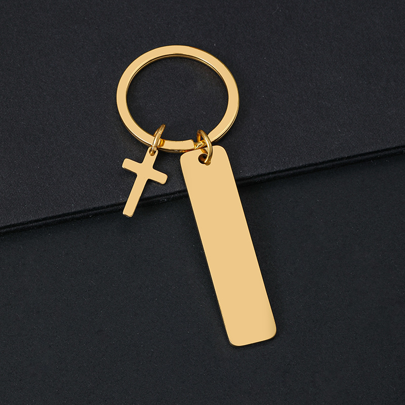 Porte-clés croix longue 50*12mm-or