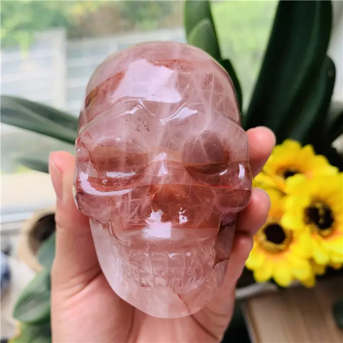 Venta al por mayor de cristal tallada cráneos de curación natural rojo hematoid fuego cráneos de cristal de cuarzo para feng shui
