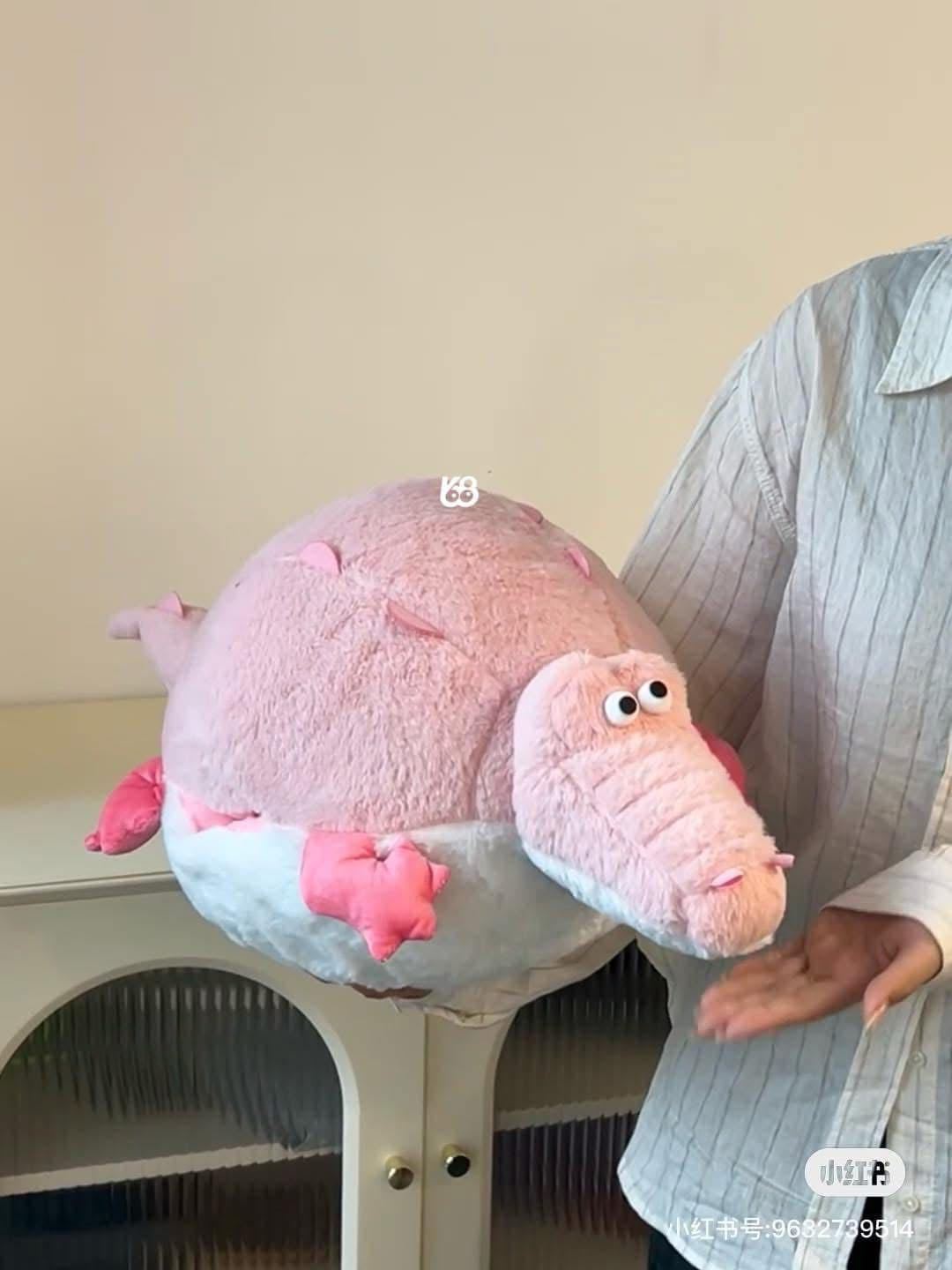 Pink crocodile hand warmer