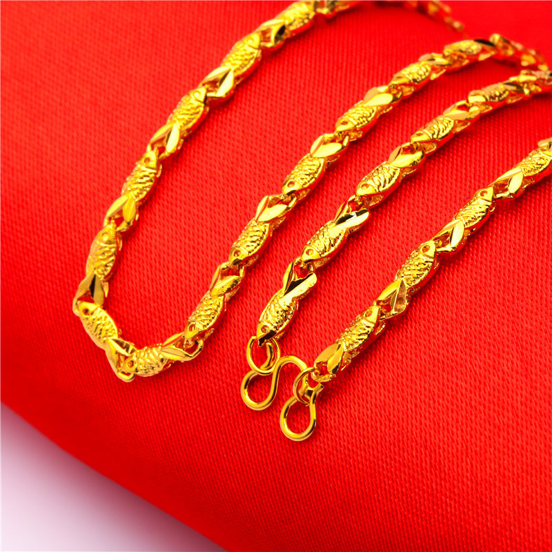 Collana con ciondolo a forma di pesciolino - Oro