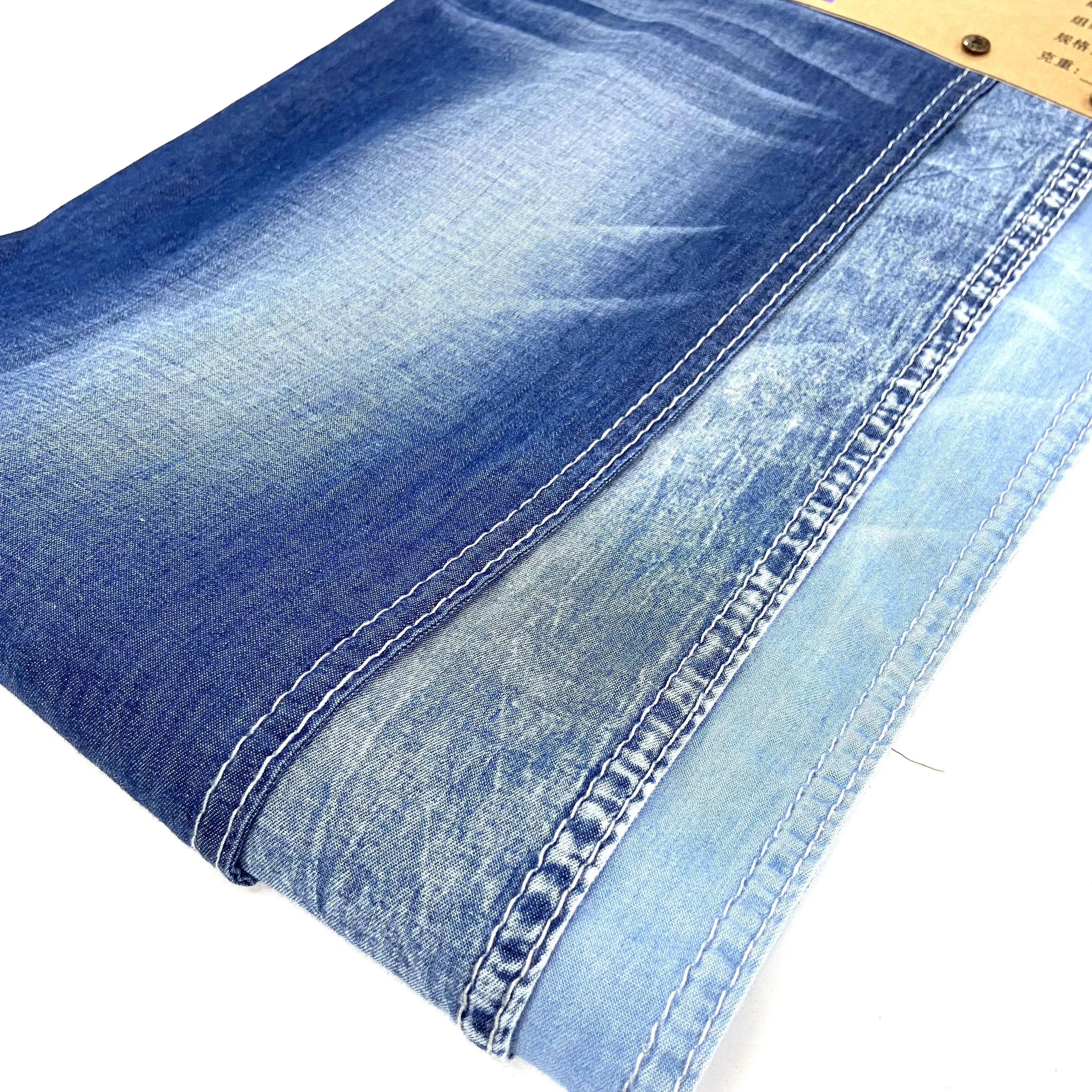 Ham yıkanmış kenar örme pamuk denim jean kumaş üretimi stok lot yüksek kalite streç denim kumaş toptan fiyatlar