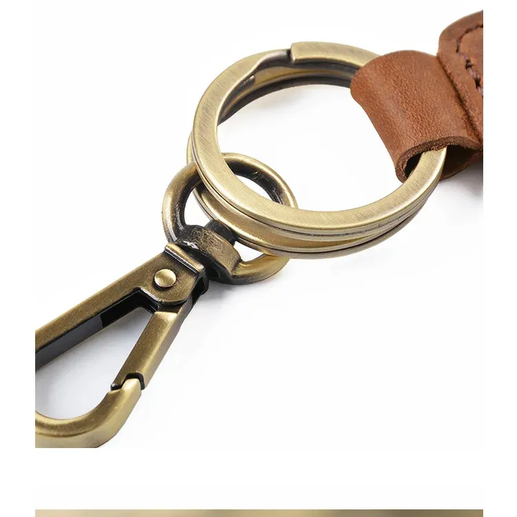 Keychain Handmade Da Bò retro với da chính hãng Keychain đơn giản và thiết thực điên da ngựa tùy chỉnh logo hợp kim 4 màu