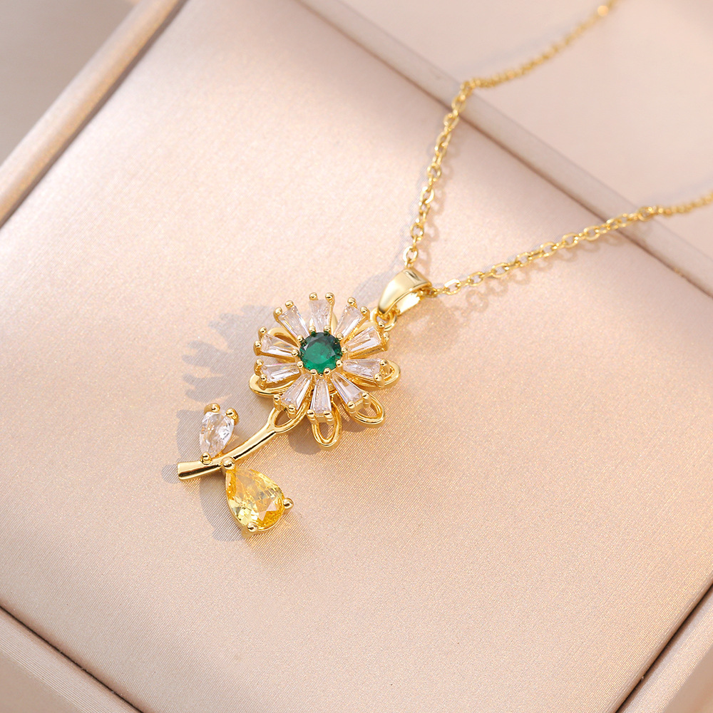 Collier rotatif tournesol doré X0571