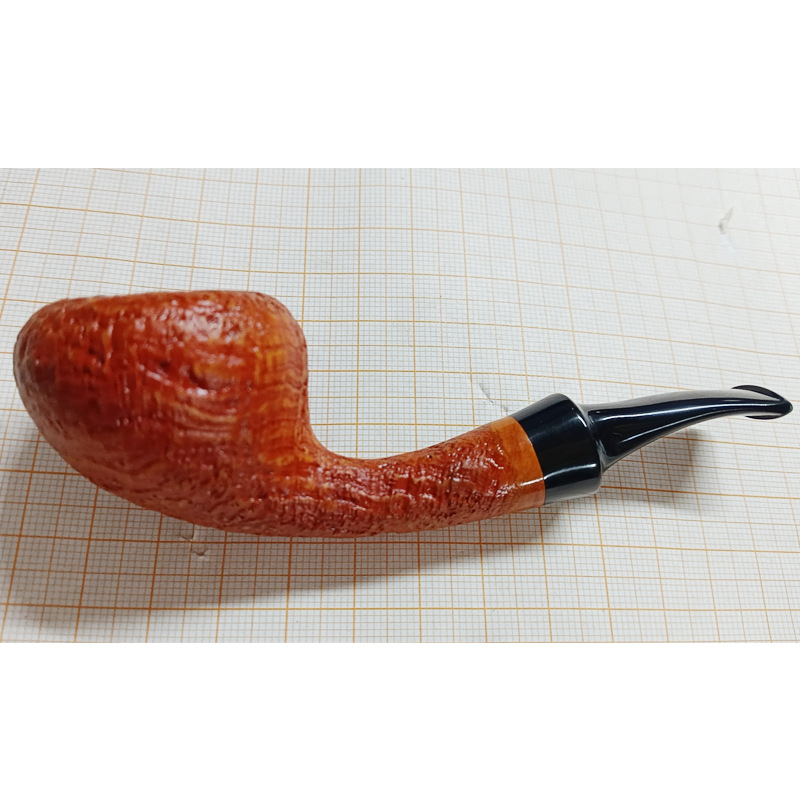 Light-colored sandblasted black saddle