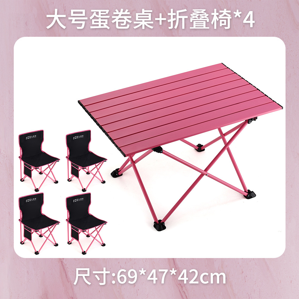 Large pink table and black/pink folding chairs (4 chairs)