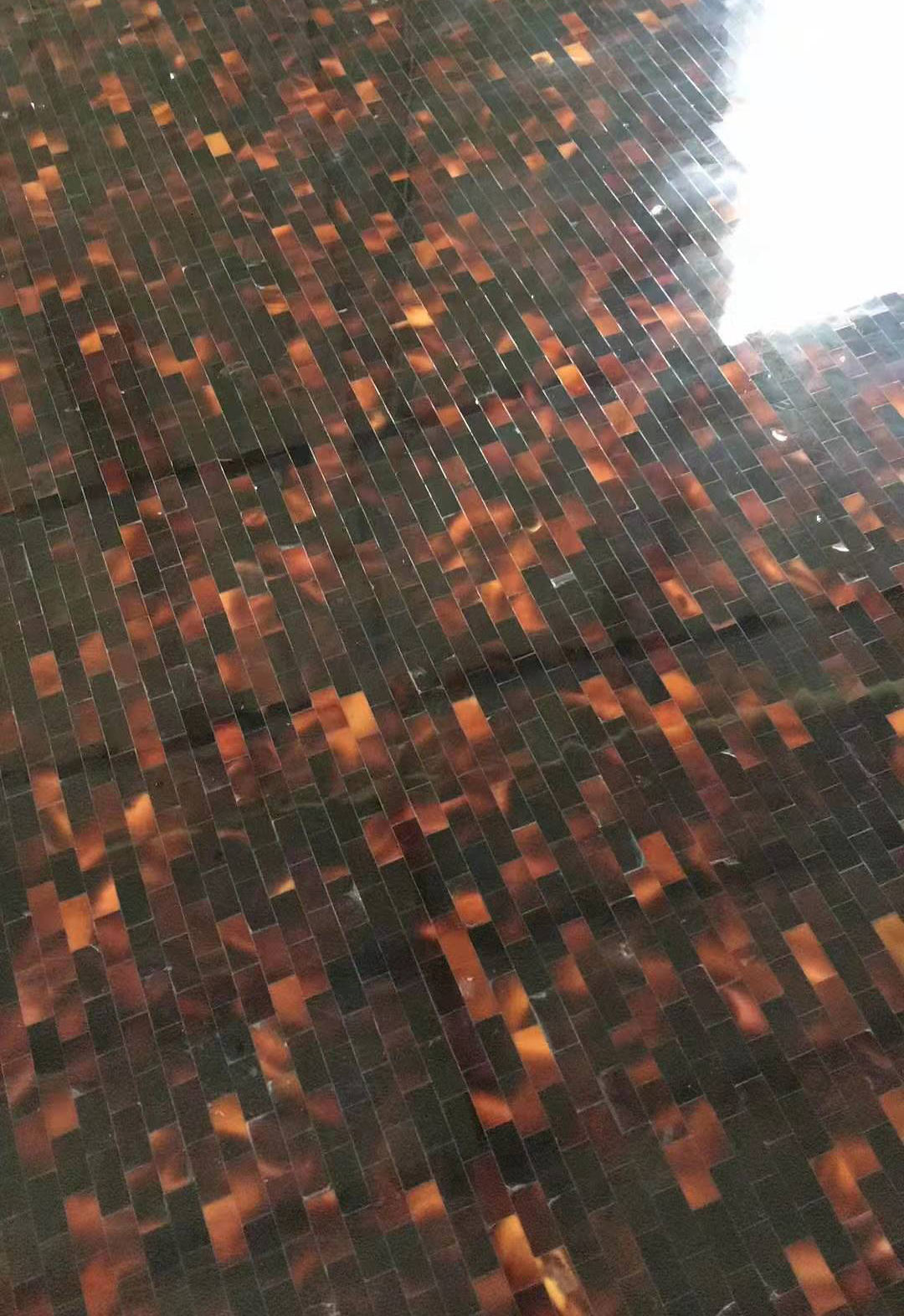 Mosaïque de coquille de stylo noir