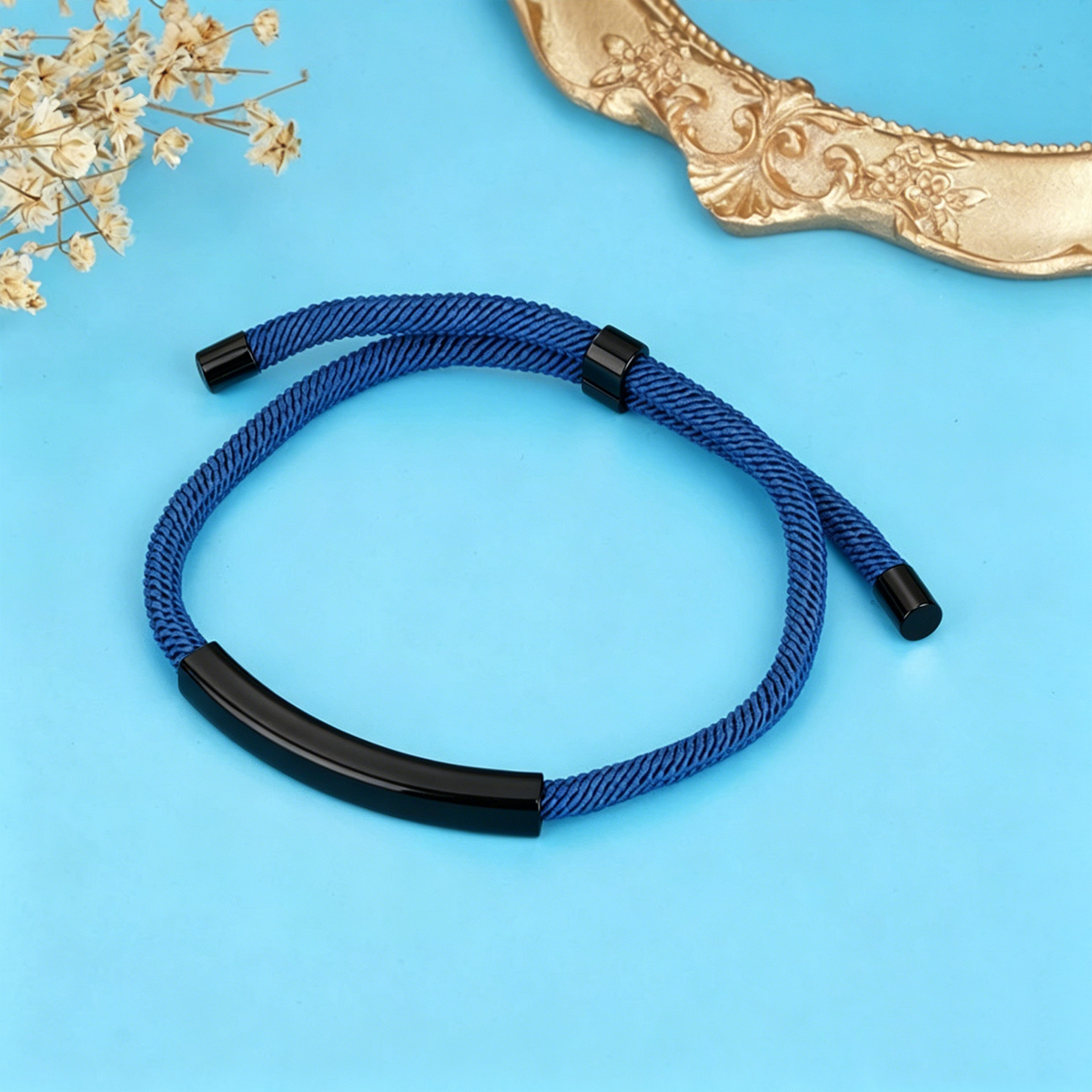 Ciondolo nero + cordoncino blu