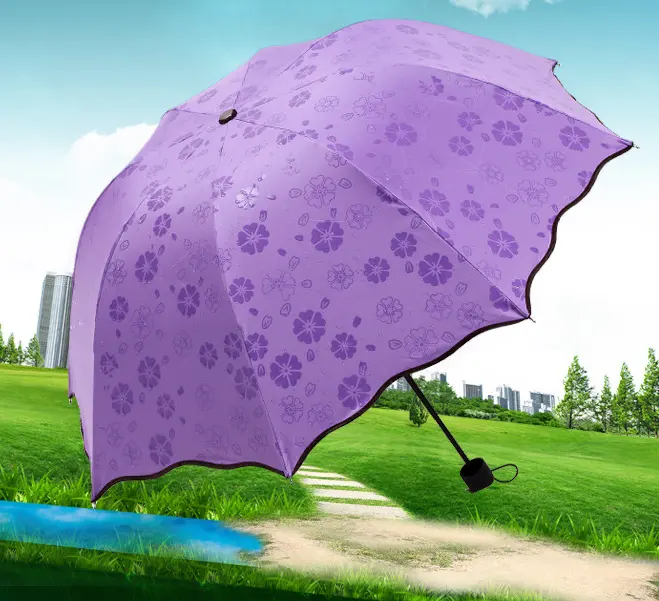 Meet Water-paraguas plegable para mujer, sombrilla mágica con estampado de flores que cambian de color, uv 3