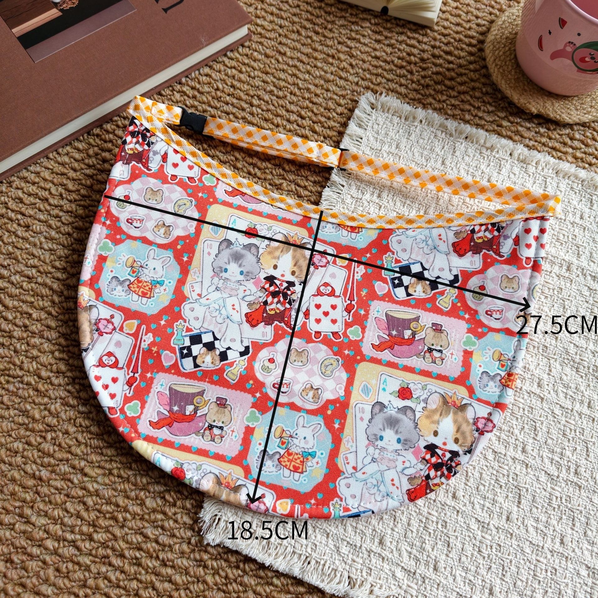Red-background princess dress with large cat bib