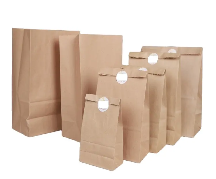 Il commercio all'ingrosso ha sacchetti di carta kraft con logo sacchetti di carta per la spesa bianchi kraft personalizzati