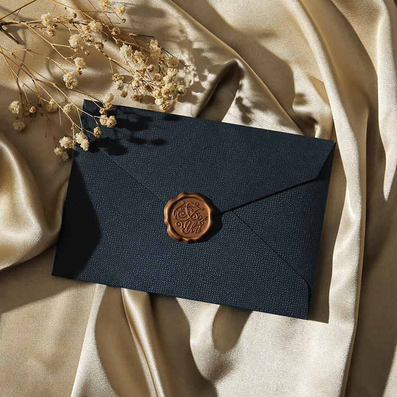 1 enveloppe en lin bleu + 1 sceau de cire