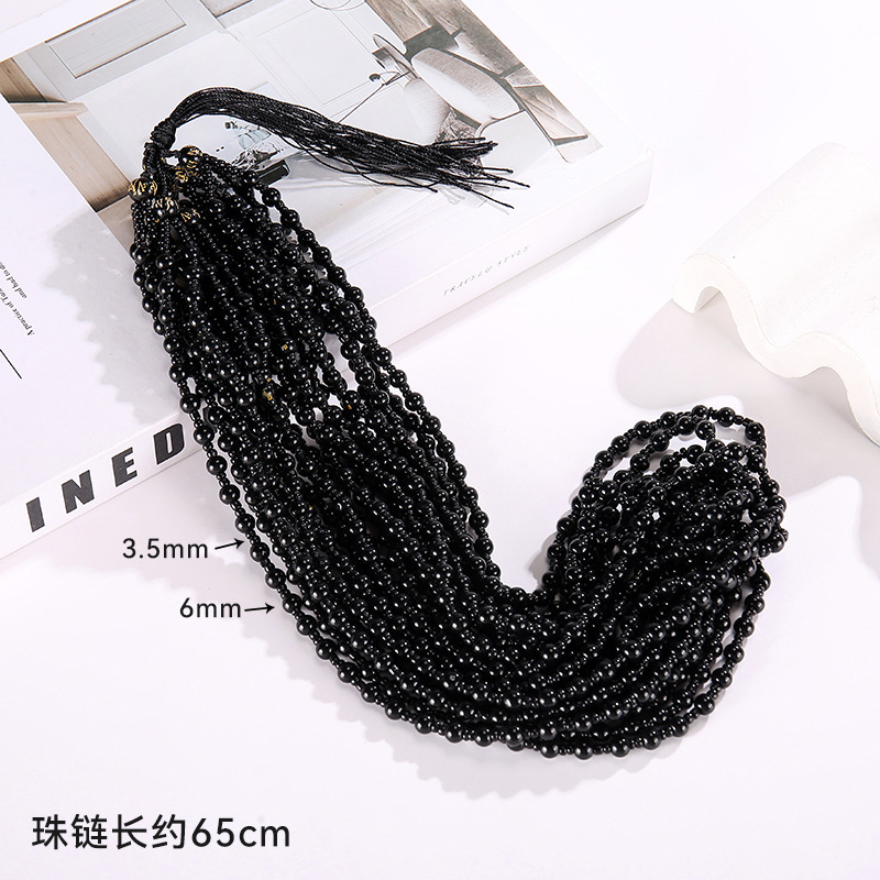 14 Collier de perles noires à six caractères