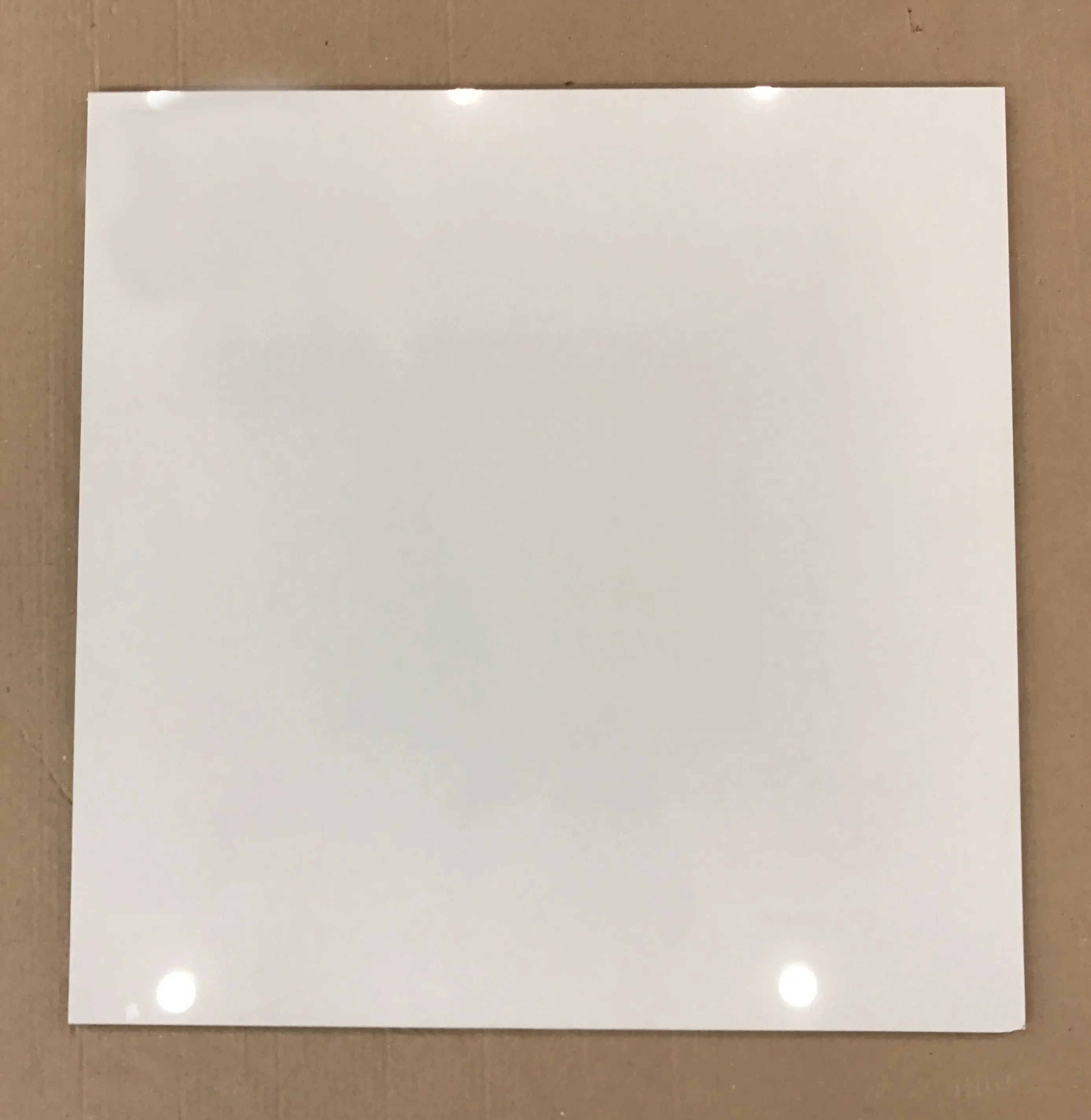 Venta caliente Marfil Blanco 600x600 Azulejo de porcelana pulida Sal soluble Doble carga Precio de fábrica Porcelana brillante