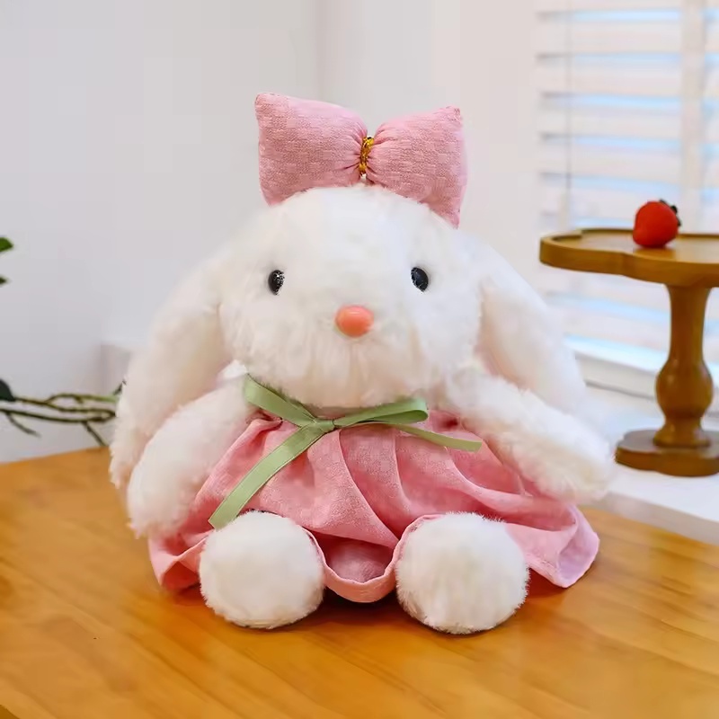 Vestido rosa de princesa con lazo de conejo y botones.