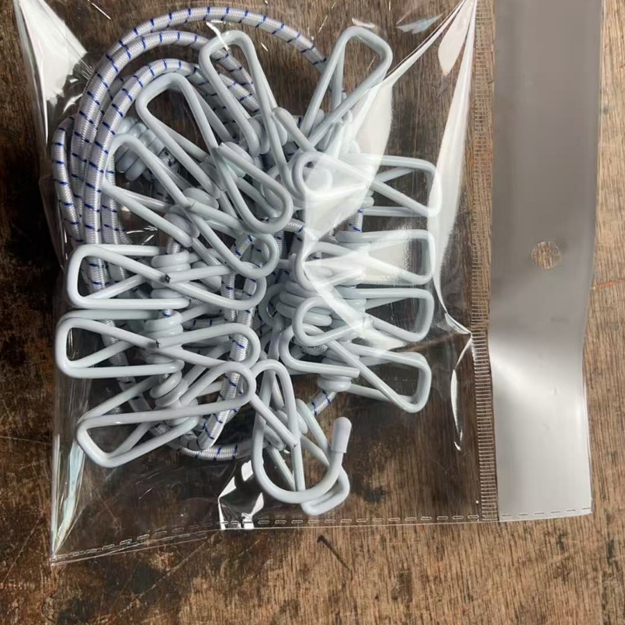 Corde à linge de 18 m avec 12 pinces blanches