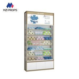 XJMS-AW2-LBJ-07 Professional Medicine Display Rack for Retail <strong>Pharmacies</strong> Golden Universal Glass Cabinet with Adjustable Shelves - Product Image 1