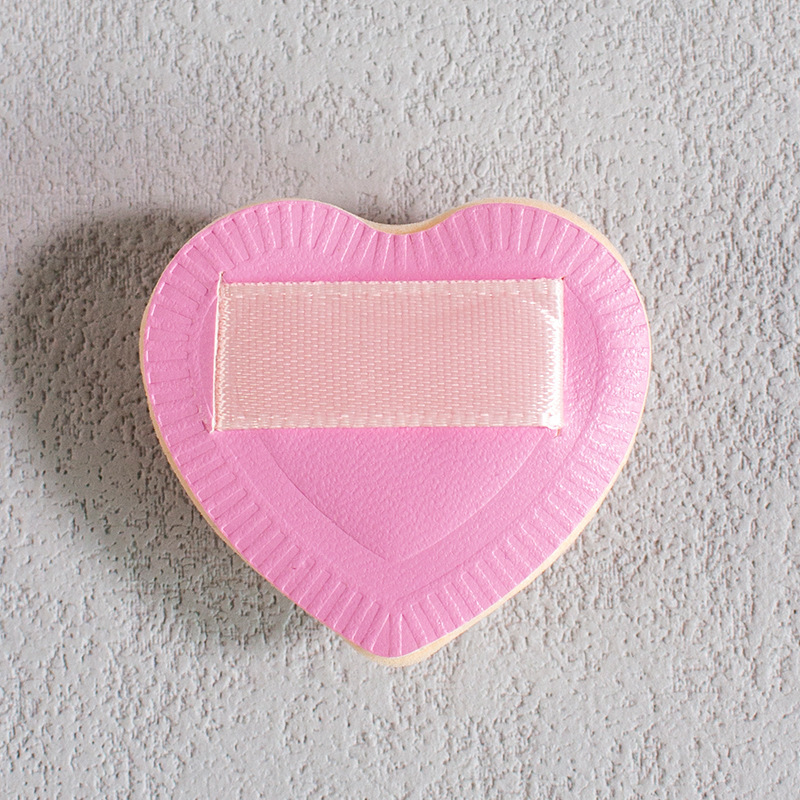 Malvavisco en forma de corazón rosa para los dedos.