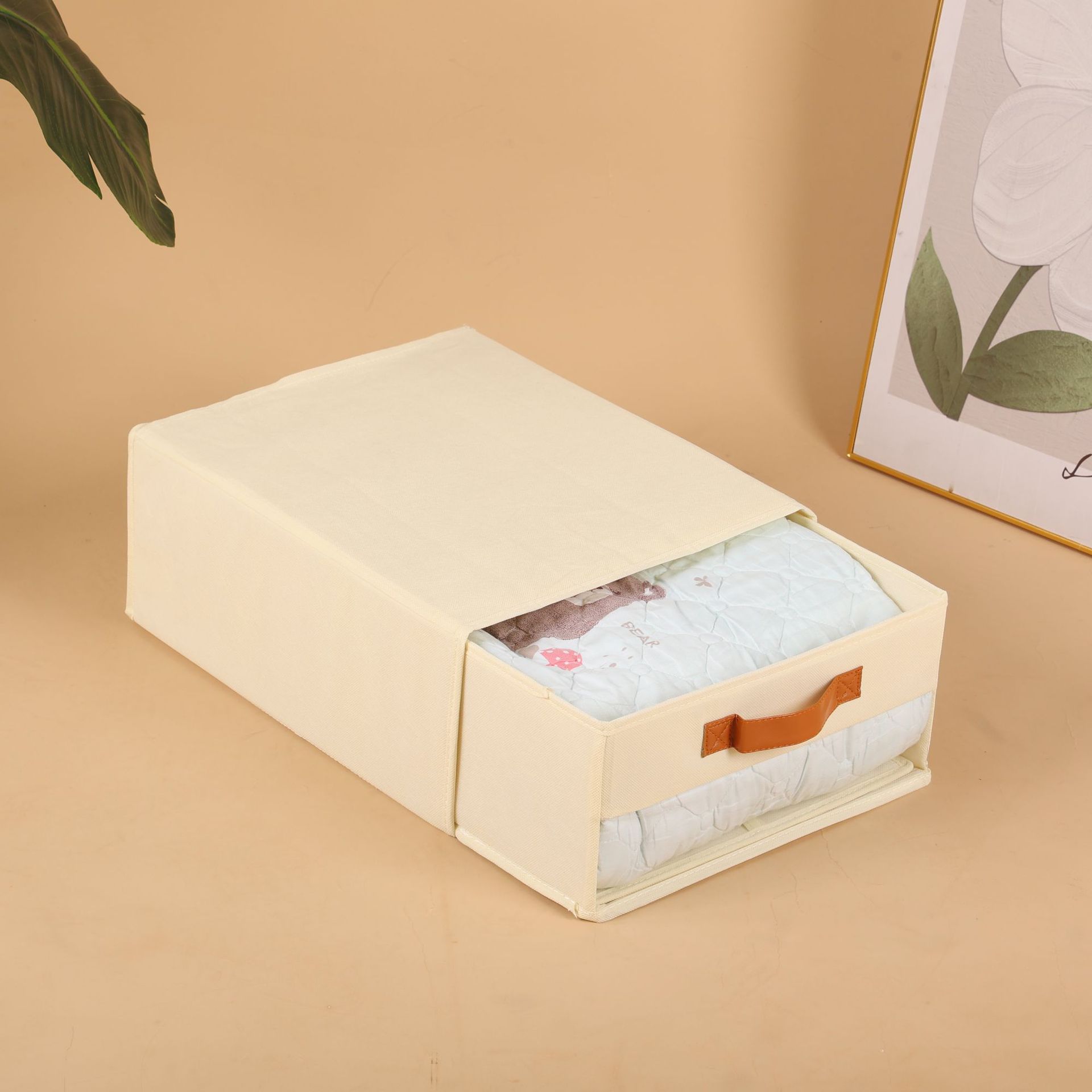 Drawer-style bed sheet storage box with beige leather handle