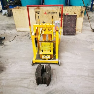 Piezas de repuesto para máquina de ladrillos de cemento de enclavamiento de alta calidad, fabricante automático de bloques huecos de 220V con Motor de molde para materia prima de arena - Product Image 3