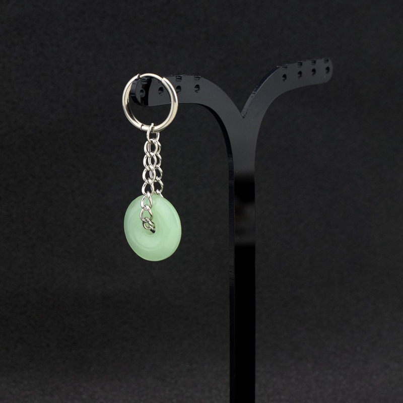 E027-Green1 (Une boucle d'oreille avec trous pour les oreilles)