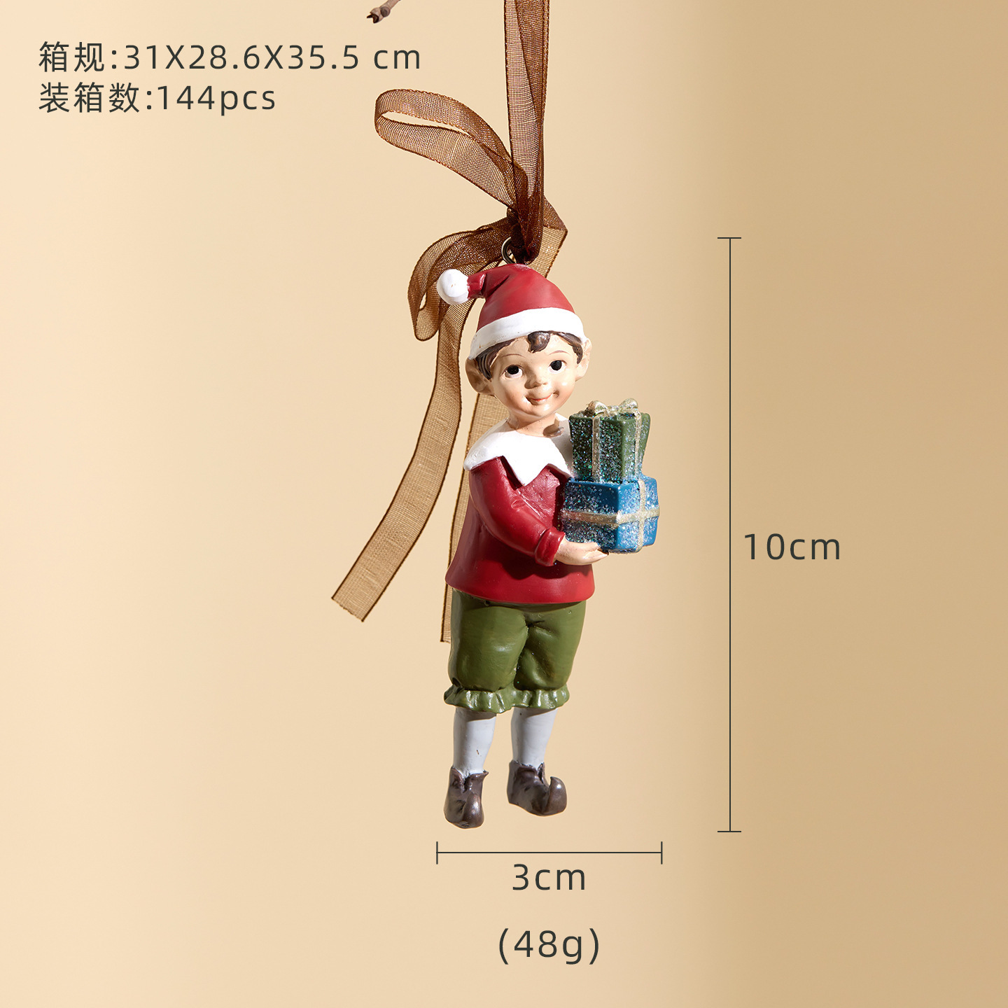 Petit garçon tenant une boîte cadeau-fd8156