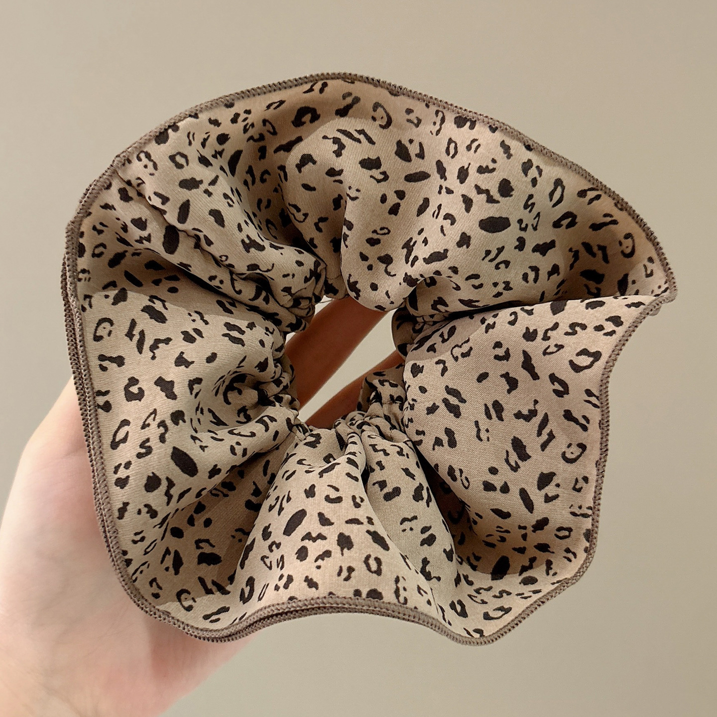 2 anneaux de cheveux léopard clair-15cm
