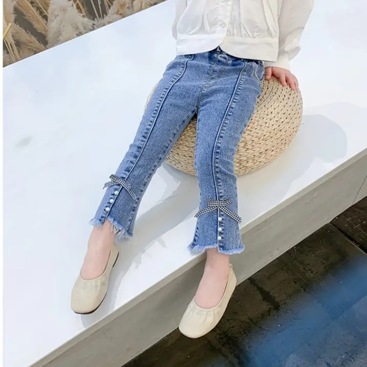 Jeans per ragazze pantaloni in denim micro pull per bambini pantaloni elastici con spacco alla moda all'ingrosso