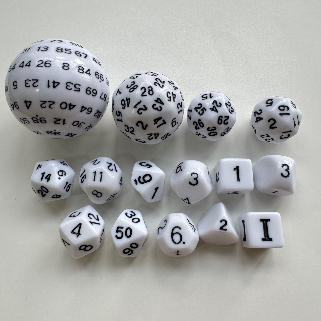 Set of 15 white dots black oil