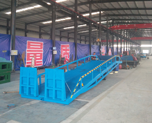 El fabricante suministra directamente rampas de carga de contenedores de puente de embarque móvil de elevación Nivelador de muelle móvil 6T 8T 12T - Product Image 3