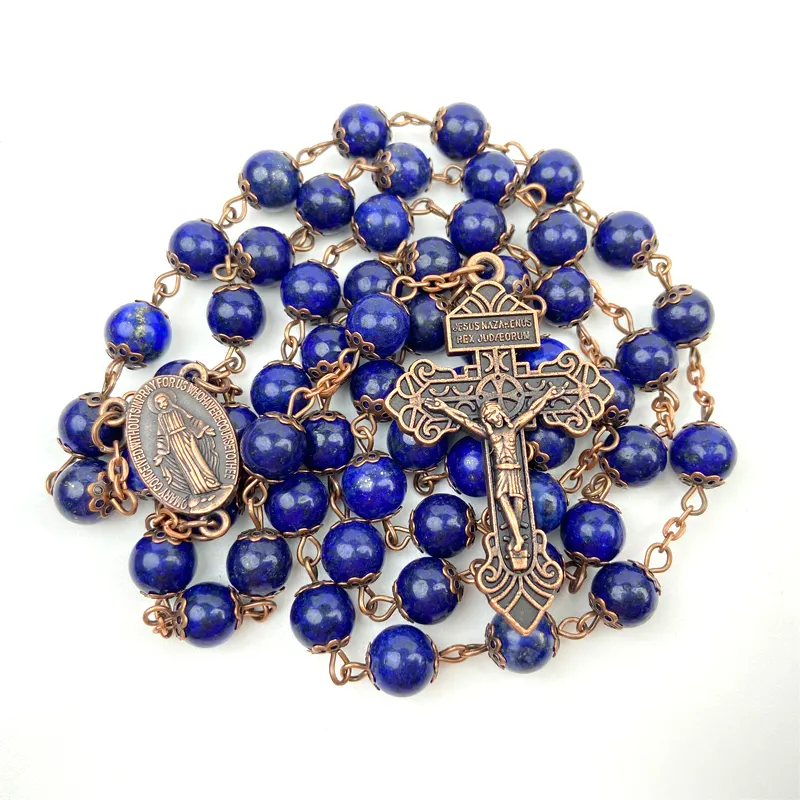 Lapallaite in rilievo con medaglia cristiana mirasa e rosario cattolico a croce realizzato con pietre naturali blu Navy