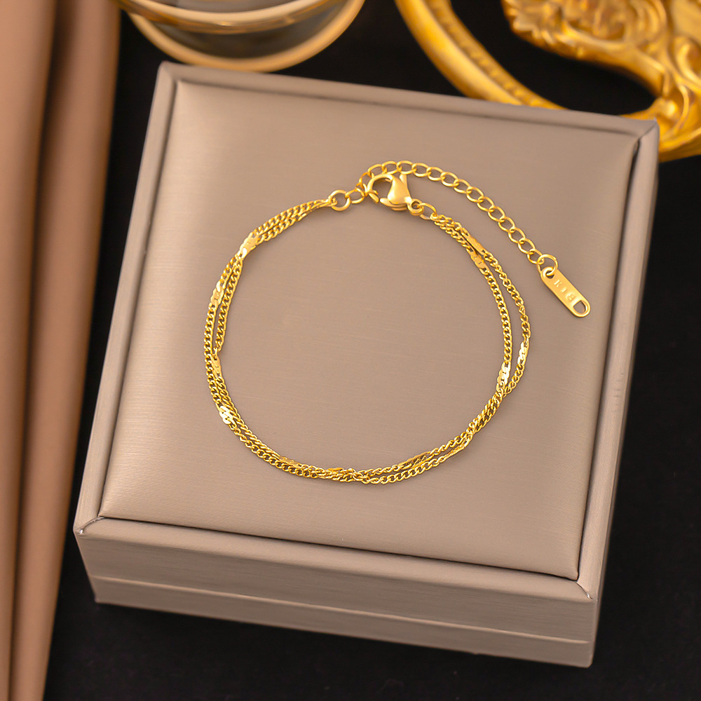 Bracelet chaîne plate dorée, modèle sle141.