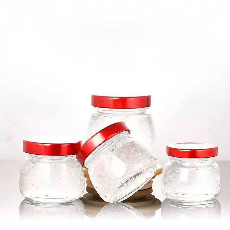 Aceptamos tarro de almacenamiento de alimentos de cocina de vidrio redondo transparente personalizado con tapa de hojalata para mermelada de miel regalos de alimentos para bebés