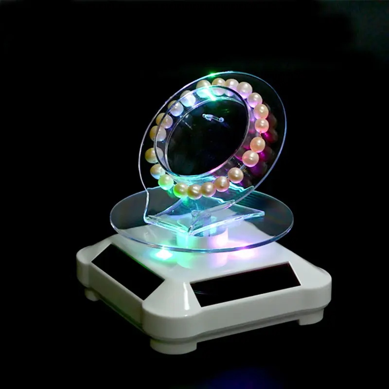 Présentoir rotatif à énergie solaire Bracelet présentoir rotatif spécial pour bijoux avec LED colorée