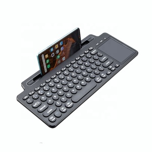 Teclado BT con panel táctil inalámbrico OEM 2,4G con soporte incorporado y fácil control de medios para tableta/teléfono/computadora portátil de oficina