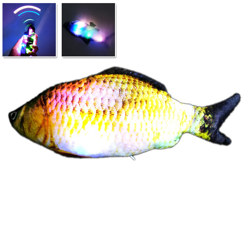 musica + illuminazione + pesce oscillante (carpa gialla)