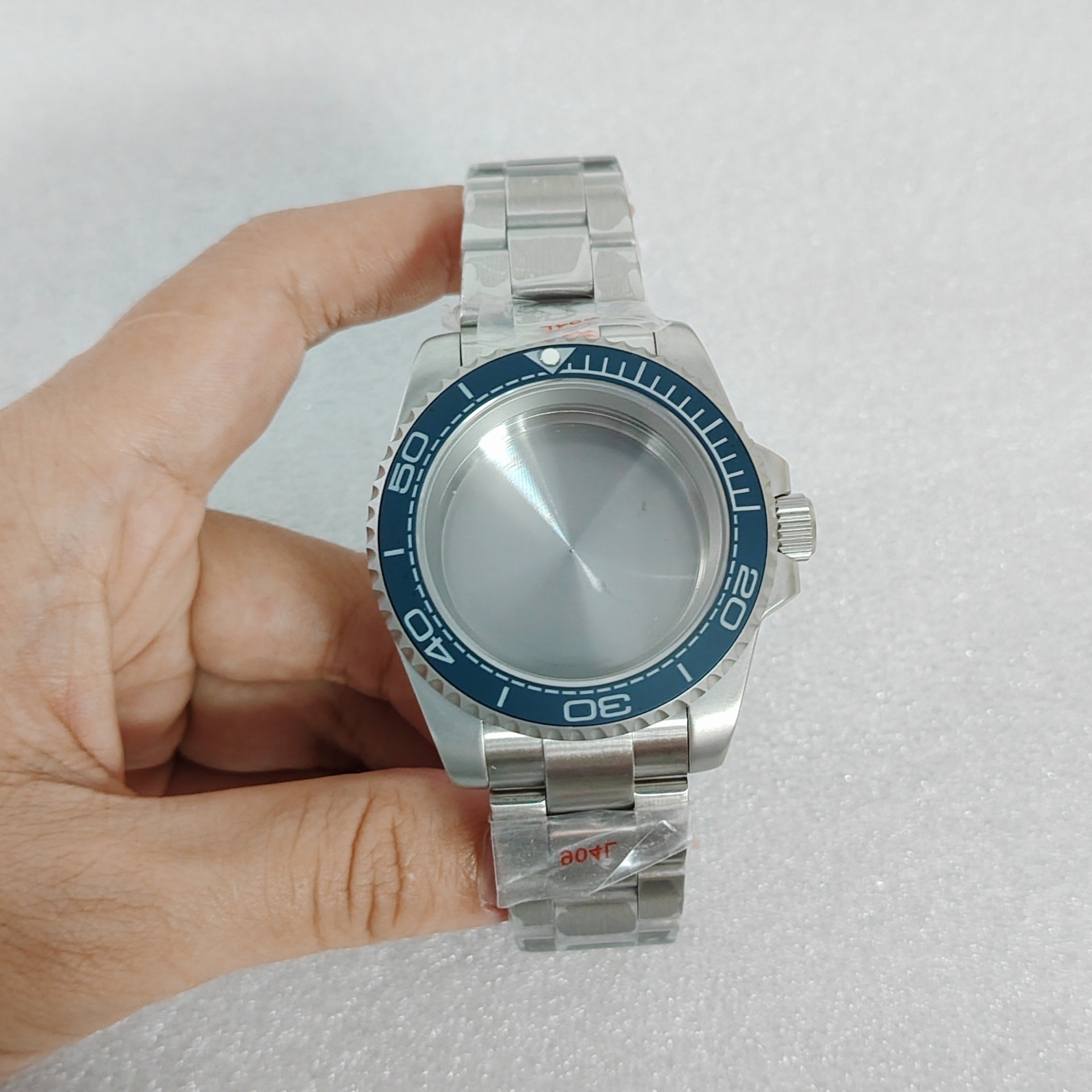 Dark blue circle with white text magnifying glass