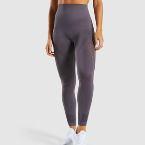 Hot Style High-Waisted Seamless <strong>Yoga</strong> Pants with Hollow-Out Hip Lift &amp; Casual Running Features New <strong>Promotion</strong> Solid Pattern