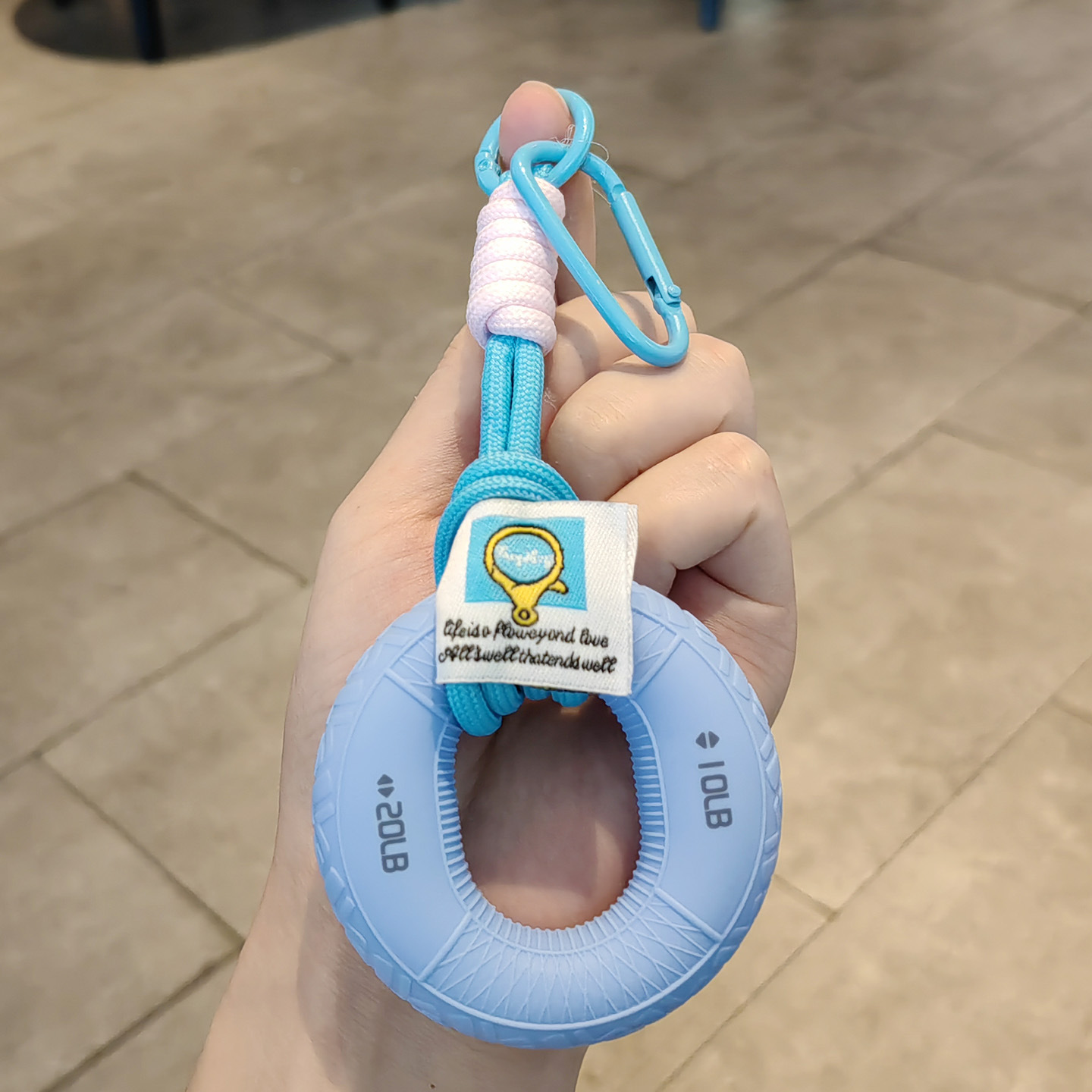 Cordón con anillo de agarre azul