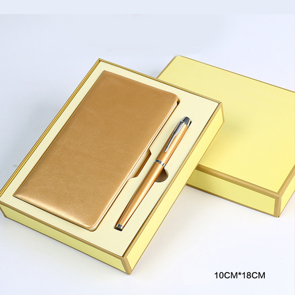 Oro-pluma + cuaderno