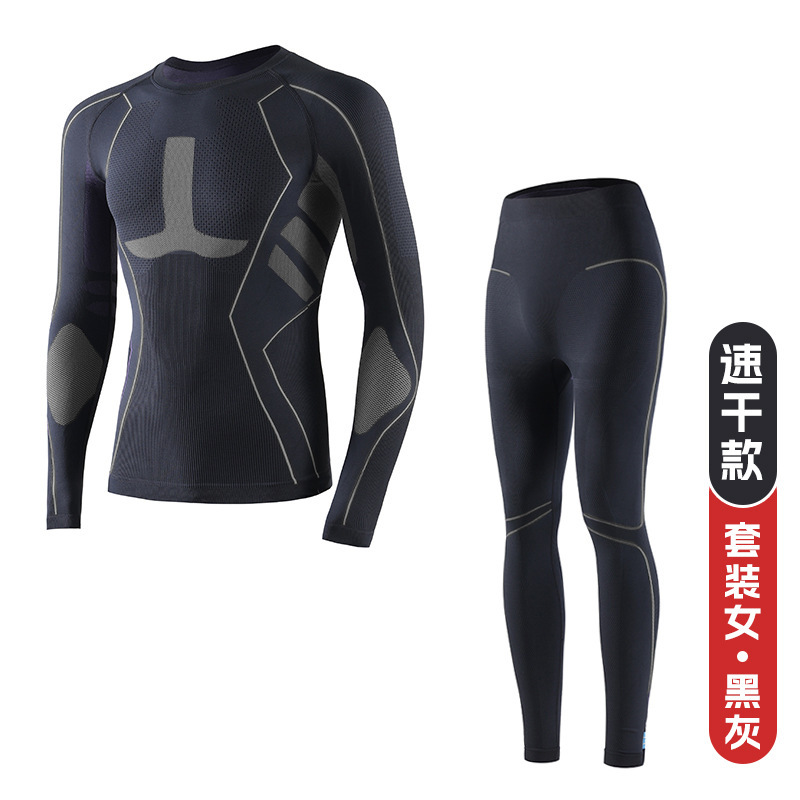 Traje negro y gris (mujer)