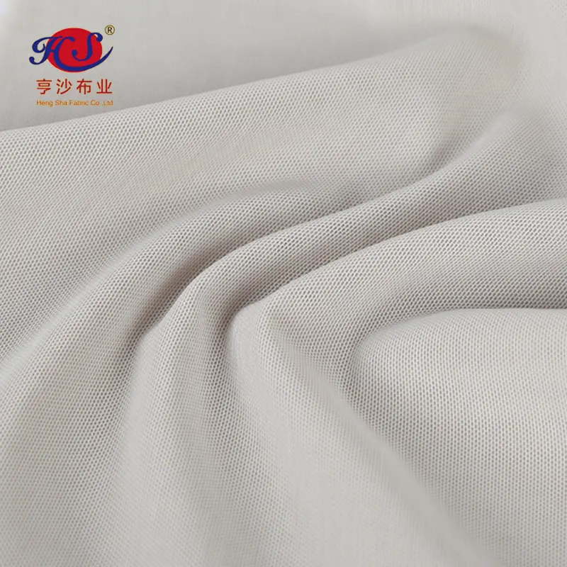 Hot sell Knitting Fabric Blend Spandex And Polyester/ Nylon Mesh Fabric Customized Quick Dry Mesh Fabric Women Suit Pants