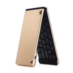Venta al por mayor Mini teclado ultrafino plegable inalámbrico Bluetooth teclado para Android Smartphone teclado colorido de alta calidad