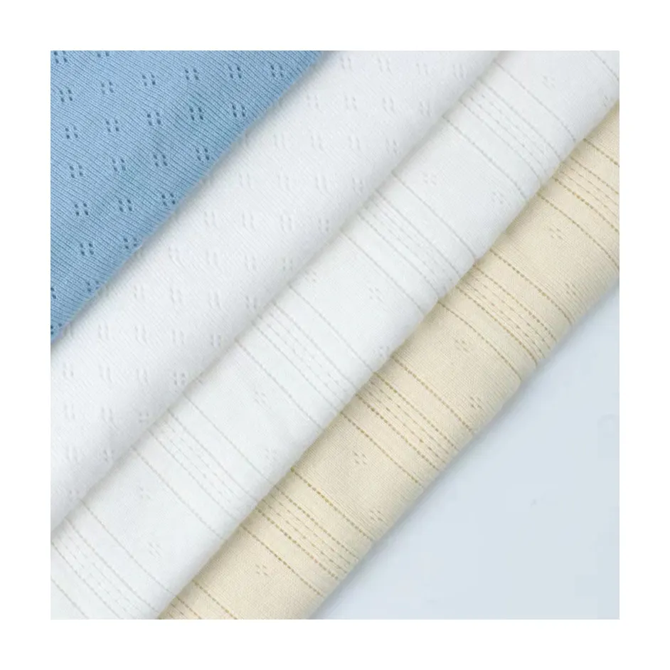 Vente en gros de tissu 100% coton peigné à tricoter Pointelle anti-bactéries pour bébé, barboteuse, t-shirt, débardeur, vêtements