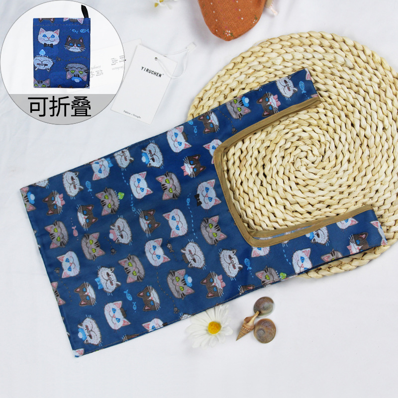 Tête de chat bleu encre de petite taille