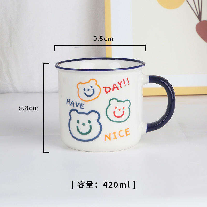 Poignée bleu foncé avec un petit motif d'ours.