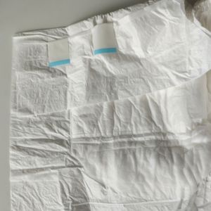 Indicador de umidade descartável, barreira anti-vazamento, filme PE de algodão estampado respirável, super absorvente para incontinência, diâmetros
