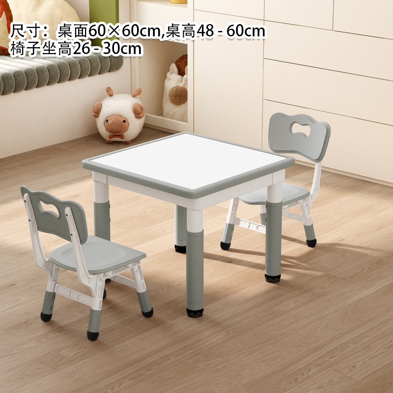 Whiteboard, gray table, two chairs